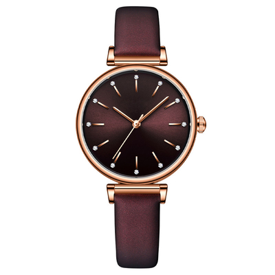 Die Stulpen-Uhr-Lederband-Luxusdamen-Uhren der Legierungs-Quarz-Frauen lederner